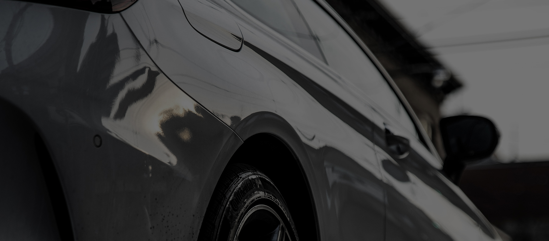 Close up a parked grey car